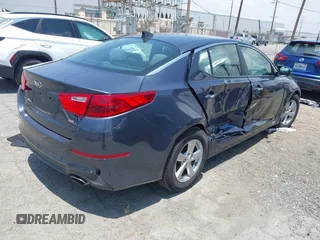2015 Kia Optima LX with VIN 5XXGM4A78FG441226, listed as a IAAI auction lot 42576517 with 166,212 mi miles and . Bid and sale history available at DreamBid. Image 4.