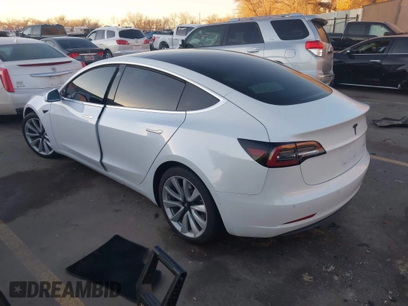 2018 Tesla Model 3 Long Range Battery z VIN 5YJ3E1EB4JF067895, wystawiony jako IAAI lot #41280101 z przebiegiem Nie podano mil oraz . Historia ofert i sprzedaży dostępna na DreamBid. Obrazek 3.