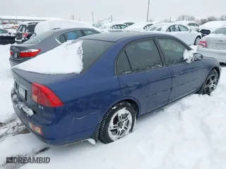 2002 Honda Civic EX with VIN 1HGES26852L010812, listed as a IAAI auction lot 41275122 with 190,612 mi miles. Bid and sale history available at carsss.com. Image 4.