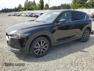 2018 Mazda CX-5 Grand Touring z VIN JM3KFBDMXJ0322105, wystawiony jako Copart lot #57089275 z przebiegiem 77 994 mil mil oraz Szkoda całkowita • Salvage title. Historia ofert i sprzedaży dostępna na DreamBid. Obrazek 1.