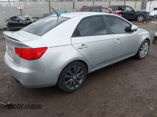 2010 Kia Forte SX with VIN KNAFW4A39A5230517, listed as a IAAI auction lot 41953297 with 154,711 mi miles. Bid and sale history available at carsss.com. Image 4.