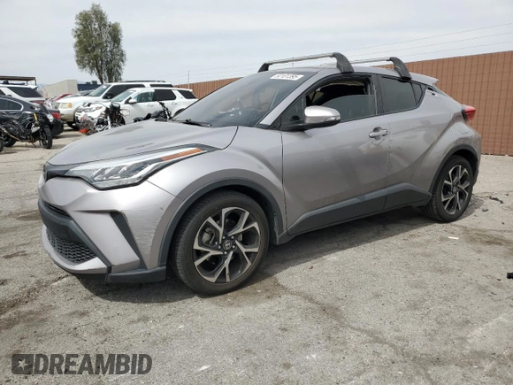 2020 Toyota C-HR LE with VIN JTNKHMBX7L1065098, listed as a Copart auction lot 50101395 with 51,933 mi miles and Salvage Title. Bid and sale history available at DreamBid. Image 1.
