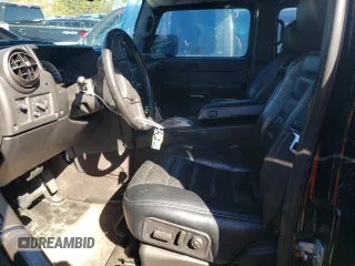 2006 Hummer H2 z VIN 5GRGN23U06H104393, wystawiony jako Copart lot #46208975 z przebiegiem 168 053 mil mil oraz Szkoda całkowita • Salvage title. Historia ofert i sprzedaży dostępna na DreamBid. Obrazek 7.