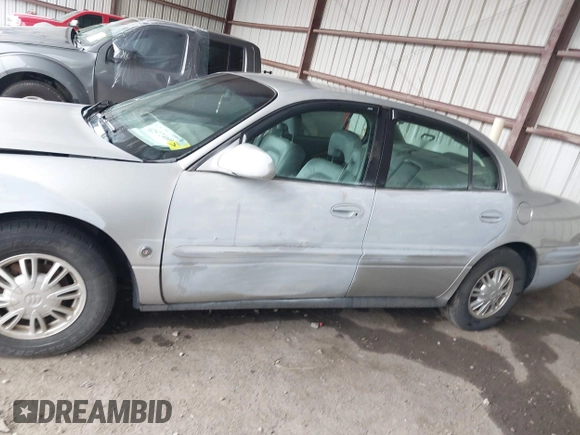 2003 Buick LeSabre Limited z VIN 1G4HR54K13U209094, wystawiony jako IAAI lot #42572460 z przebiegiem 102 970 mil mil oraz . Historia ofert i sprzedaży dostępna na DreamBid. Obrazek 14.