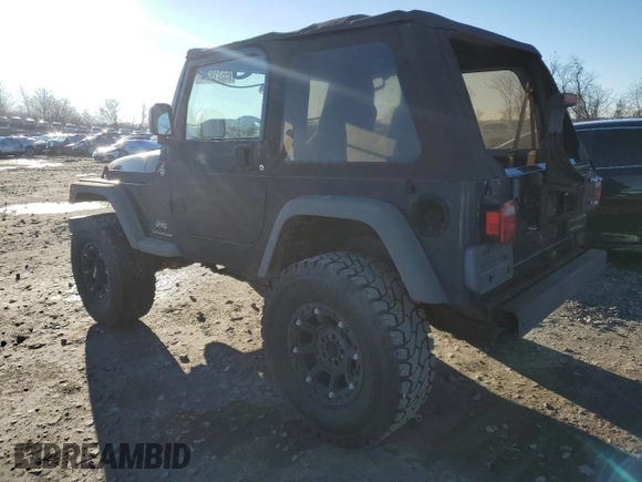 2005 Jeep Wrangler SE with VIN 1J4FA29S95P370542, listed as a Copart auction lot 85571924 with 105,465 mi miles and Salvage Title. Bid and sale history available at carsss.com. Image 2.