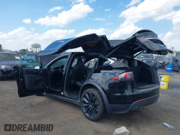 2019 Tesla Model X 75D with VIN 5YJXCBE21KF180203, listed as a IAAI auction lot 42190255 with 114,294 mi miles and . Bid and sale history available at DreamBid. Image 22.
