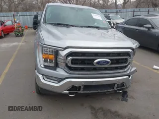 2021 Ford F-150 XL with VIN 1FTFW1E80MFC88733, listed as a IAAI auction lot 41434310 with 31,295 mi miles. Bid and sale history available at carsss.com. Image 12.