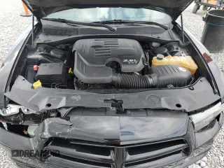 2013 Dodge Charger SXT z VIN 2C3CDXJG2DH615726, wystawiony jako Copart lot #53116535 z przebiegiem 304 919 mil mil oraz Szkoda całkowita • Salvage title. Historia ofert i sprzedaży dostępna na DreamBid. Obrazek 11.