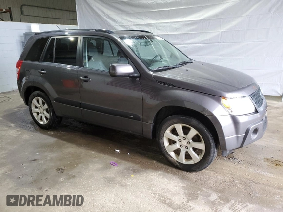 2012 Suzuki Grand Vitara Limited z VIN JS3TD0D76C4100949, wystawiony jako Copart lot #55834305 z przebiegiem 241 042 mil mil oraz Czysty tytuł • Clean title. Historia ofert i sprzedaży dostępna na DreamBid. Obrazek 4.