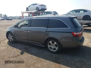 2012 Honda Odyssey Touring with VIN 5FNRL5H90CB505590, listed as a Copart auction lot 62566715 with 323,092 mi miles and Clean title. Bid and sale history available at DreamBid. Image 2.