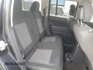 2014 Jeep Patriot Latitude with VIN 1C4NJRFB0ED649779, listed as a Copart auction lot 60444435 with 161,009 mi miles and Salvage title. Bid and sale history available at DreamBid. Image 11.