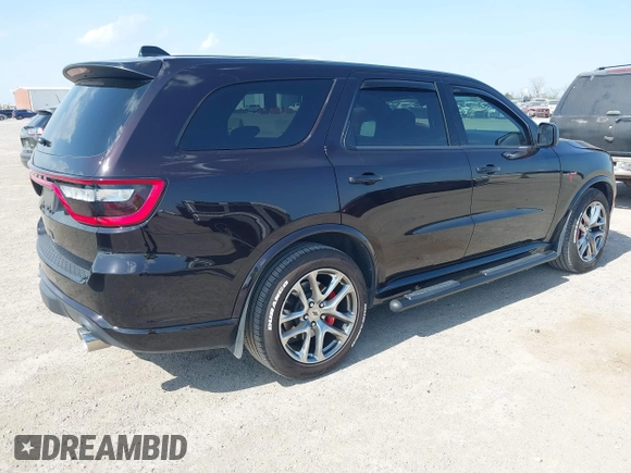 2023 Dodge Durango R/T Plus z VIN 1C4SDJCT2PC693591, wystawiony jako IAAI lot #41858050 z przebiegiem 9 238 mil mil oraz . Historia ofert i sprzedaży dostępna na DreamBid. Obrazek 4.