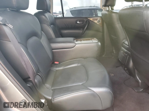 2017 Infiniti QX80 z VIN JN8AZ2NF1H9643990, wystawiony jako Copart lot #55598085 z przebiegiem 129 961 mil mil oraz Szkody całkowita. Historia ofert i sprzedaży dostępna na DreamBid. Obrazek 11.