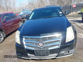 2009 Cadillac CTS AWD z VIN 1G6DH577290166448, wystawiony jako IAAI lot #41751610 z przebiegiem 158 378 mil mil oraz . Historia ofert i sprzedaży dostępna na DreamBid. Obrazek 12.