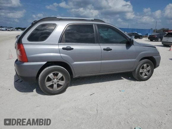 2009 Kia Sportage LX with VIN KNDJF724597601906, listed as a Copart auction lot 45317365 with 196,474 mi miles and Salvage Title. Bid and sale history available at carsss.com. Image 3.
