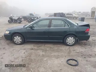 2001 Honda Accord LX z VIN 1HGCG56461A033694, wystawiony jako IAAI lot #41804320 z przebiegiem 250 000 mil mil oraz . Historia ofert i sprzedaży dostępna na DreamBid. Obrazek 14.