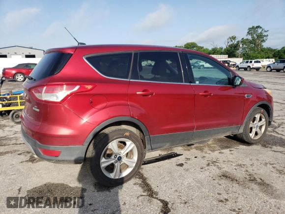 2013 Ford Escape SE with VIN 1FMCU0GX1DUB90907, listed as a Copart auction lot 57789785 with 113,525 mi miles and Salvage title. Bid and sale history available at DreamBid. Image 3.