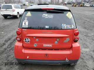 2012 Smart fortwo Pure z VIN WMEEJ3BA2CK571073, wystawiony jako Copart lot #51215135 z przebiegiem 78 686 mil mil oraz Szkoda całkowita • Salvage title. Historia ofert i sprzedaży dostępna na DreamBid. Obrazek 6.