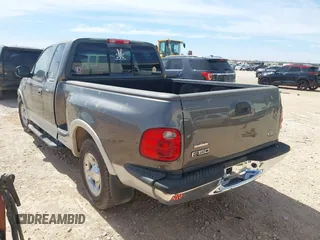 2002 Ford F-150 XL with VIN 1FTRX07L92KC81256, listed as a IAAI auction lot 41765831 with 149,506 mi miles. Bid and sale history available at carsss.com. Image 3.
