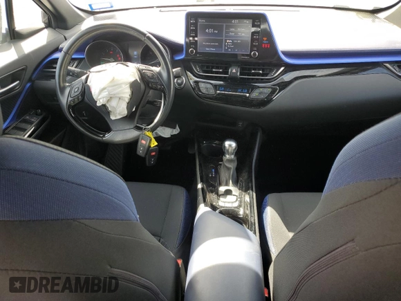 2021 Toyota C-HR LE z VIN NMTKHMBX8MR130564, wystawiony jako Copart lot #56711535 z przebiegiem 94 007 mil mil oraz Szkoda całkowita • Salvage title. Historia ofert i sprzedaży dostępna na DreamBid. Obrazek 8.