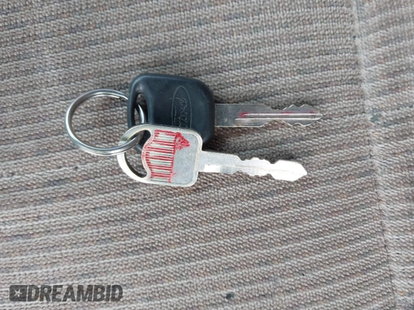 1999 Mercury Mystique GS z VIN 1MEFM6538XK606647, wystawiony jako IAAI lot #41613999 z przebiegiem 90 978 mil mil oraz . Historia ofert i sprzedaży dostępna na DreamBid. Obrazek 11.