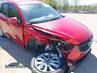 2015 Mazda CX-5 Grand Touring with VIN JM3KE4DY5F0469439, listed as a IAAI auction lot 42053851 with 70,676 mi miles. Bid and sale history available at carsss.com. Image 6.
