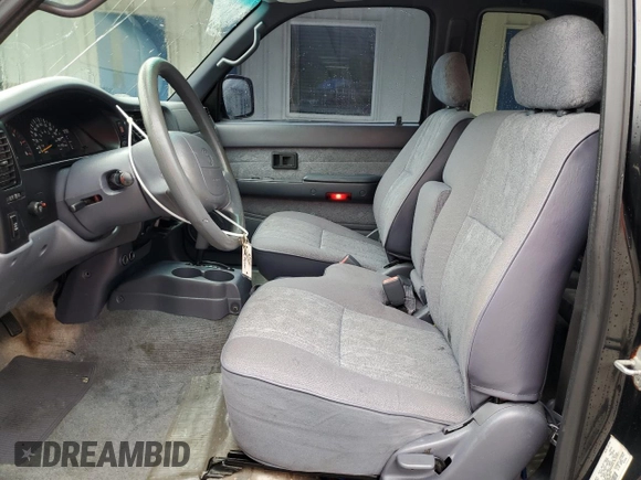2000 Toyota Tacoma PreRunner with VIN 4TASM92N0YZ649603, listed as a Copart auction lot 63256445 with 177,530 mi miles and Salvage title. Bid and sale history available at DreamBid. Image 7.