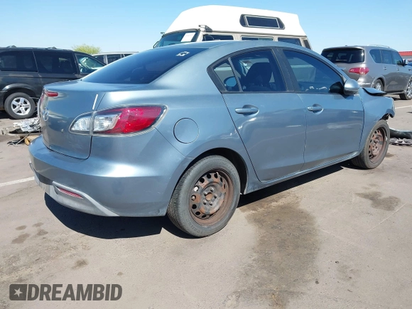 2010 Mazda Mazda3 i Touring with VIN JM1BL1SG5A1164355, listed as a IAAI auction lot 42044865 with 127,809 mi miles. Bid and sale history available at carsss.com. Image 4.