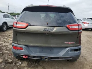 2015 Jeep Cherokee Trailhawk with VIN 1C4PJMBSXFW545534, listed as a Copart auction lot 62236885 with 148,448 mi miles and Clean title. Bid and sale history available at DreamBid. Image 6.
