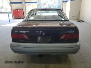 1992 Ford Taurus z VIN 1FACP50U4NA144506, wystawiony jako Copart lot #80000064 z przebiegiem 40 600 mil mil oraz Czysty tytuł • Clean title. Historia ofert i sprzedaży dostępna na DreamBid. Obrazek 6.