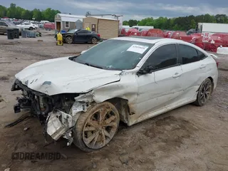 2019 Honda Civic Si z VIN 2HGFC1E51KH701626, wystawiony jako IAAI lot #42059028 z przebiegiem 120 151 mil mil oraz . Historia ofert i sprzedaży dostępna na DreamBid. Obrazek 17.