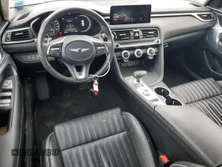 2022 Genesis G70 2.0T with VIN KMTG34TA3NU087847, listed as a Copart auction lot 83541034 with 65,891 mi miles and Salvage Title. Bid and sale history available at DreamBid. Image 8.