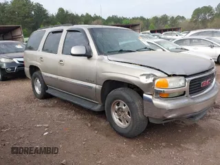 2003 GMC Yukon SLT with VIN 1GKEC13Z33R161136, listed as a IAAI auction lot 41907443 with 325,842 mi miles. Bid and sale history available at carsss.com. Image 1.