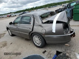2003 Lincoln Town Car Executive z VIN 1LNHM81W53Y621146, wystawiony jako Copart lot #57822605 z przebiegiem 234 384 mil mil oraz Szkoda całkowita • Salvage title. Historia ofert i sprzedaży dostępna na DreamBid. Obrazek 2.