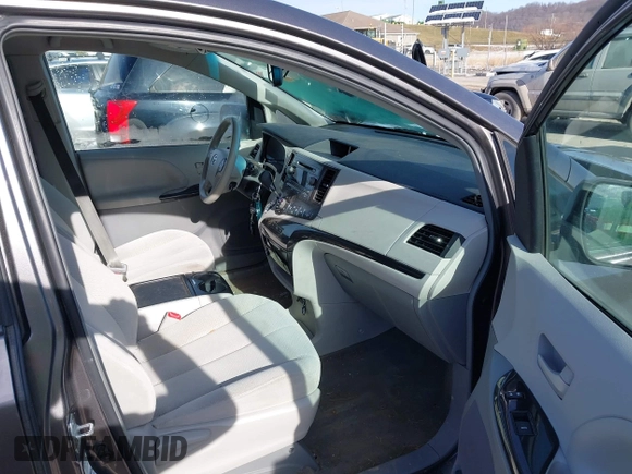 2013 Toyota Sienna LE with VIN 5TDJK3DC8DS056730, listed as a IAAI auction lot 41141247 with 166,579 mi miles and . Bid and sale history available at DreamBid. Image 5.