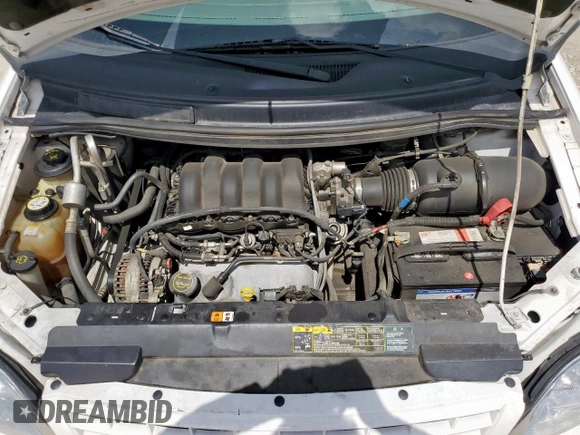 2003 Ford Windstar z VIN 2FMZA50493BA32884, wystawiony jako Copart lot #61452125 z przebiegiem 103 295 mil mil oraz Czysty tytuł • Clean title. Historia ofert i sprzedaży dostępna na DreamBid. Obrazek 12.