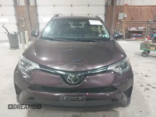 2018 Toyota RAV4 LE with VIN 2T3BFREV0JW759714, listed as a IAAI auction lot 41823084 with 119,909 mi miles and . Bid and sale history available at DreamBid. Image 12.