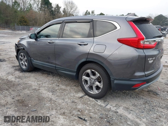 2019 Honda CR-V EX with VIN 7FARW1H57KE037678, listed as a IAAI auction lot 41790923 with 61,754 mi miles and . Bid and sale history available at DreamBid. Image 3.