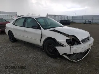 2005 Ford Taurus SE with VIN 1FAFP53215A238754, listed as a Copart auction lot 49338715 with 214,694 mi miles and Salvage Title. Bid and sale history available at carsss.com. Image 4.