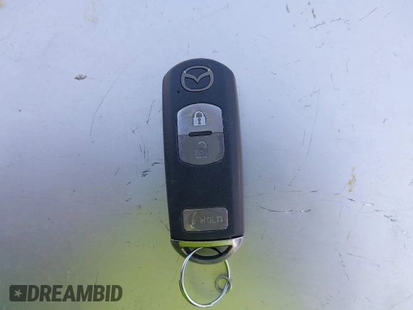 2015 Mazda CX-5 Sport with VIN JM3KE2BE8F0451014, listed as a IAAI auction lot 42536333 with 131,059 mi miles and . Bid and sale history available at DreamBid. Image 11.
