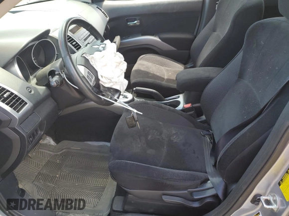 2013 Mitsubishi Outlander z VIN JA4AT2AW4DU601060, wystawiony jako Copart lot #56242575 z przebiegiem 96 268 mil mil oraz Szkoda całkowita • Salvage title. Historia ofert i sprzedaży dostępna na DreamBid. Obrazek 7.