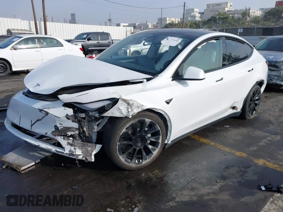2023 Tesla Model Y Long Range with VIN 7SAYGDEE3PF900030, listed as a IAAI auction lot 41147192 with 13,903 mi miles and . Bid and sale history available at DreamBid. Image 18.