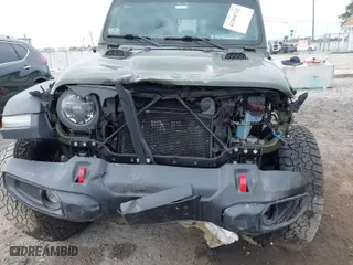 2021 Jeep Gladiator Rubicon with VIN 1C6JJTBG6ML619775, listed as a IAAI auction lot 41304732 with 37,731 mi miles. Bid and sale history available at carsss.com. Image 6.