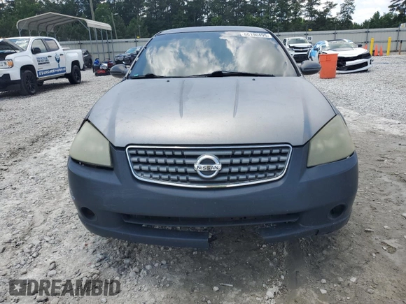 2006 Nissan Altima S with VIN 1N4AL11D76C205718, listed as a Copart auction lot 60190495 with 194,247 mi miles and Salvage title. Bid and sale history available at DreamBid. Image 5.