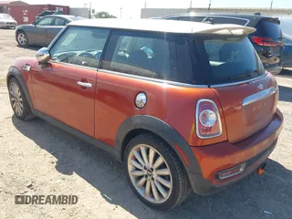 2012 MINI Hardtop S with VIN WMWSV3C56CTY26211, listed as a IAAI auction lot 41969590 with 111,299 mi miles and . Bid and sale history available at DreamBid. Image 3.