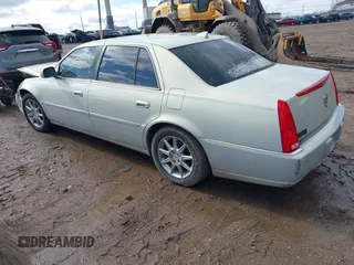 2010 Cadillac DTS w/1SC with VIN 1G6KD5EY2AU105662, listed as a IAAI auction lot 41739669 with 126,335 mi miles. Bid and sale history available at carsss.com. Image 3.