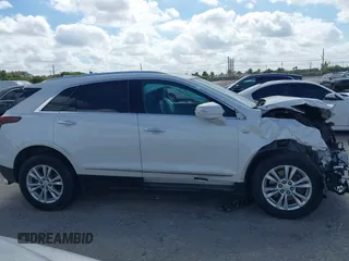 2021 Cadillac XT5 FWD Luxury with VIN 1GYKNAR40MZ146268, listed as a IAAI auction lot 41522802 with 61,775 mi miles. Bid and sale history available at carsss.com. Image 14.