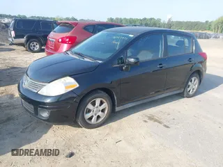 2007 Nissan Versa 1.8 S with VIN 3N1BC13E97L359537, listed as a IAAI auction lot 42127935 with 128,891 mi miles. Bid and sale history available at carsss.com. Image 2.