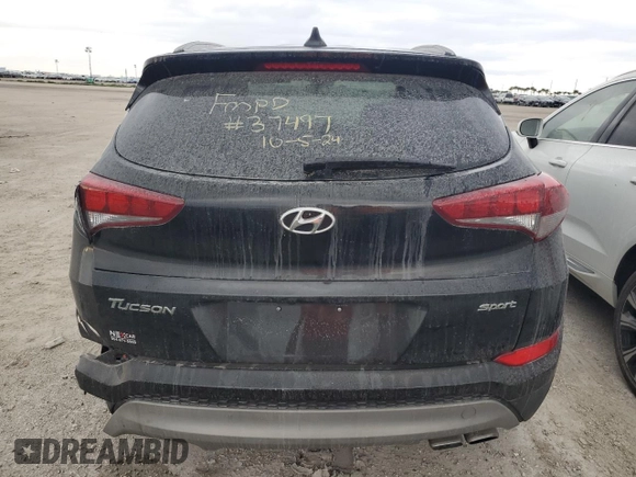 2018 Hyundai Tucson Sport with VIN KM8J33AL0JU697472, listed as a Copart auction lot 75498324 with 0 mi miles and Salvage Title. Bid and sale history available at carsss.com. Image 6.