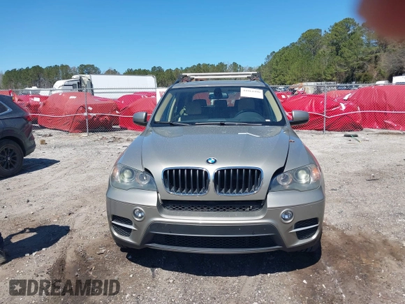 2011 BMW X5 35i z VIN 5UXZV4C57BL415565, wystawiony jako IAAI lot #41864490 z przebiegiem 176 458 mil mil oraz . Historia ofert i sprzedaży dostępna na DreamBid. Obrazek 6.